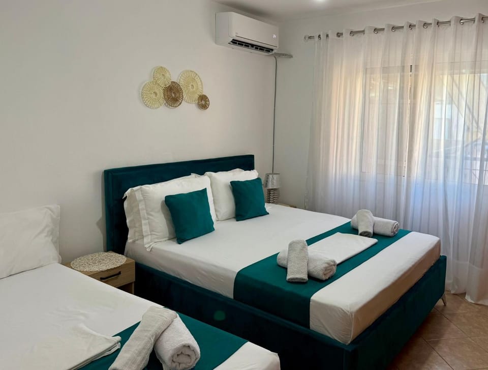 Bed, Photo of the whole room, Bedroom, towels, air conditioner