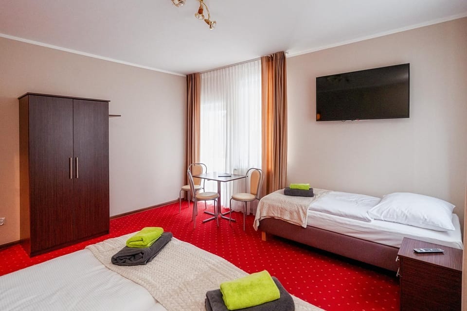 Bed, Photo of the whole room, hair dresser, towels, wardrobe