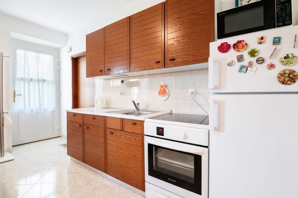 Kitchen or kitchenette, stove