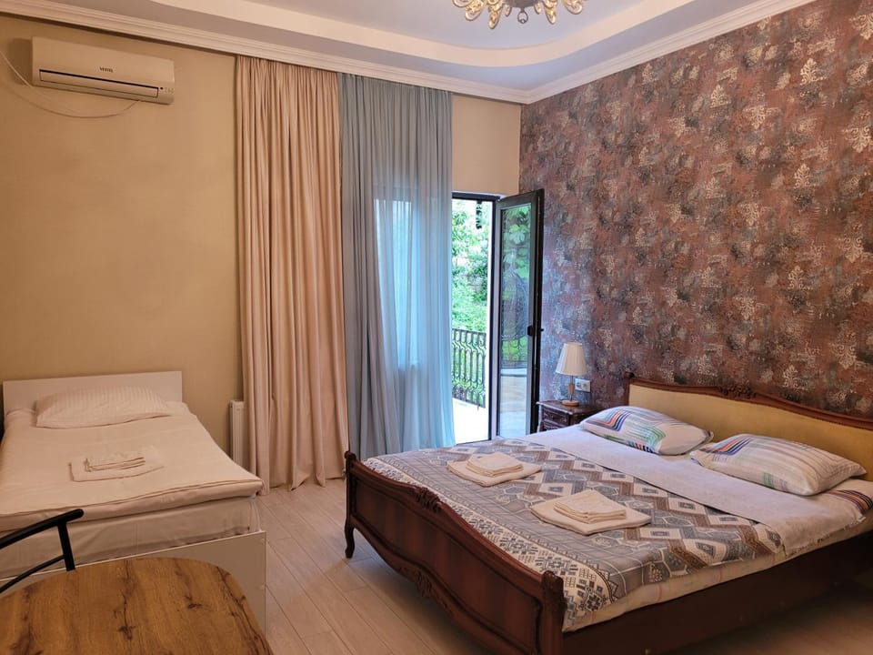 Bed, Photo of the whole room, Bedroom, towels, air conditioner