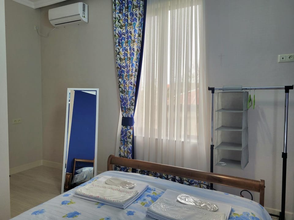 Bed, Photo of the whole room, Bedroom, towels, air conditioner