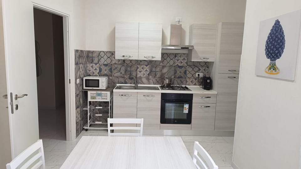 Kitchen or kitchenette, microwave, oven