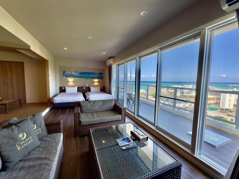 Bed, View (from property/room), Balcony/Terrace, Living room, Photo of the whole room, Seating area, Bedroom, Sea view