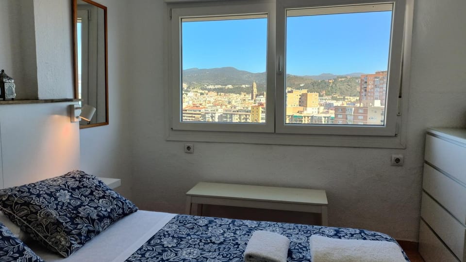 Bed, View (from property/room), Bedroom, City view, Landmark view, Mountain view, Street view, towels
