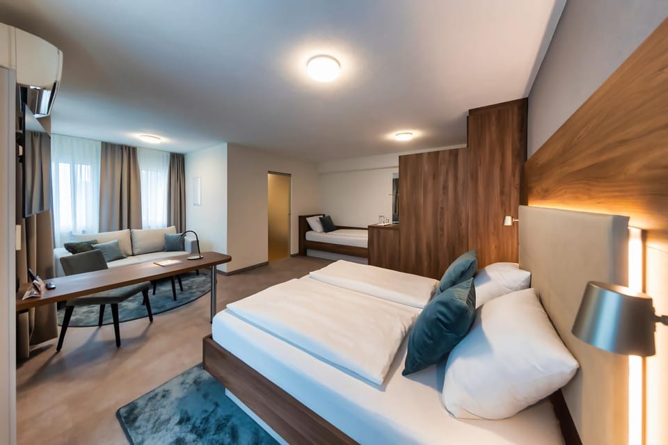 Bed, Living room, Seating area, Bedroom