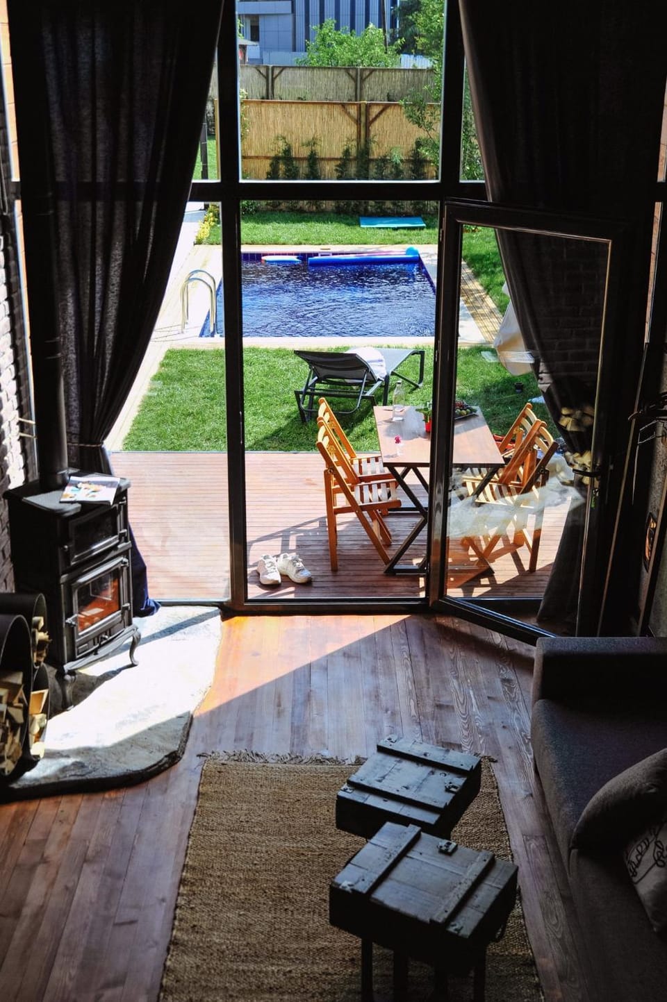Patio, Living room, Seating area, Garden view, Swimming pool