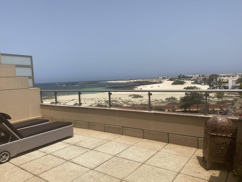Natural landscape, Balcony/Terrace, Seating area, Beach, Sea view