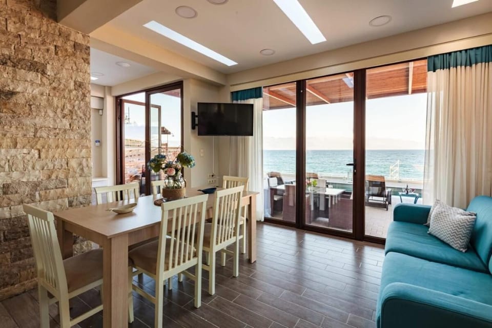 View (from property/room), Balcony/Terrace, Living room, Seating area, Sea view