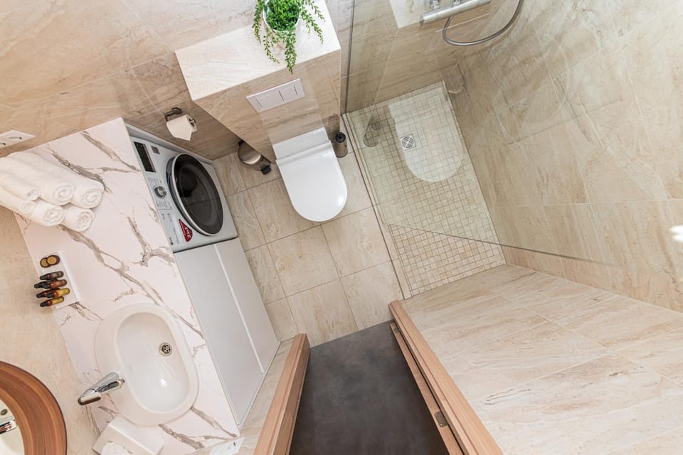 Shower, Bathroom, towels, washing machine, dryer