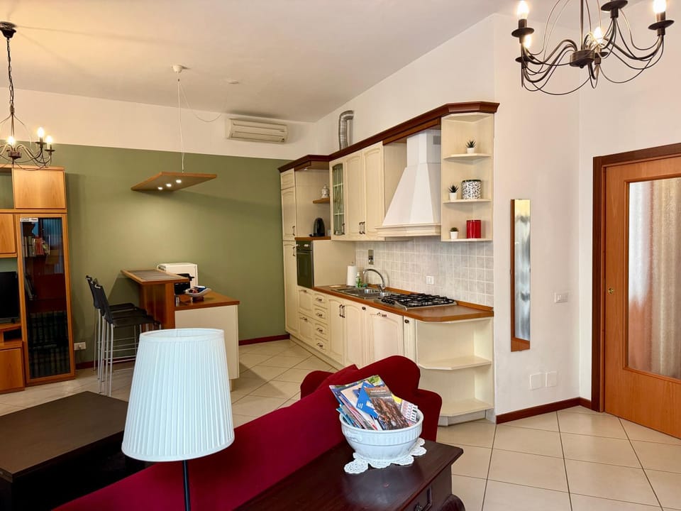 Kitchen or kitchenette, stove, air conditioner