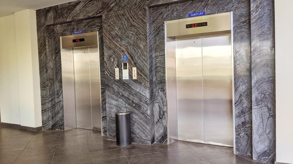 Property building, elevator
