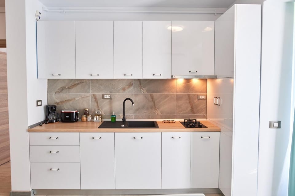 Kitchen or kitchenette, stove