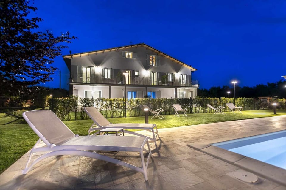 Property building, Patio, Night, Garden, Garden view, Pool view, Swimming pool, sunbed