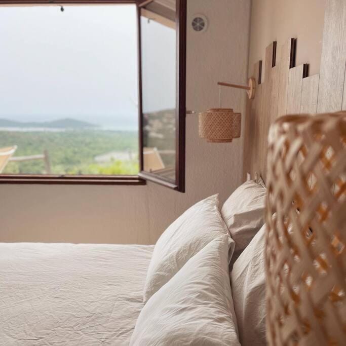 Bed, Natural landscape, Bedroom, Sea view