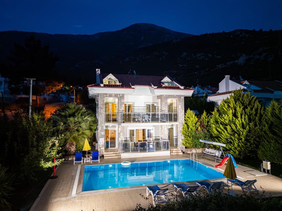 Property building, Night, Mountain view, Pool view, Swimming pool