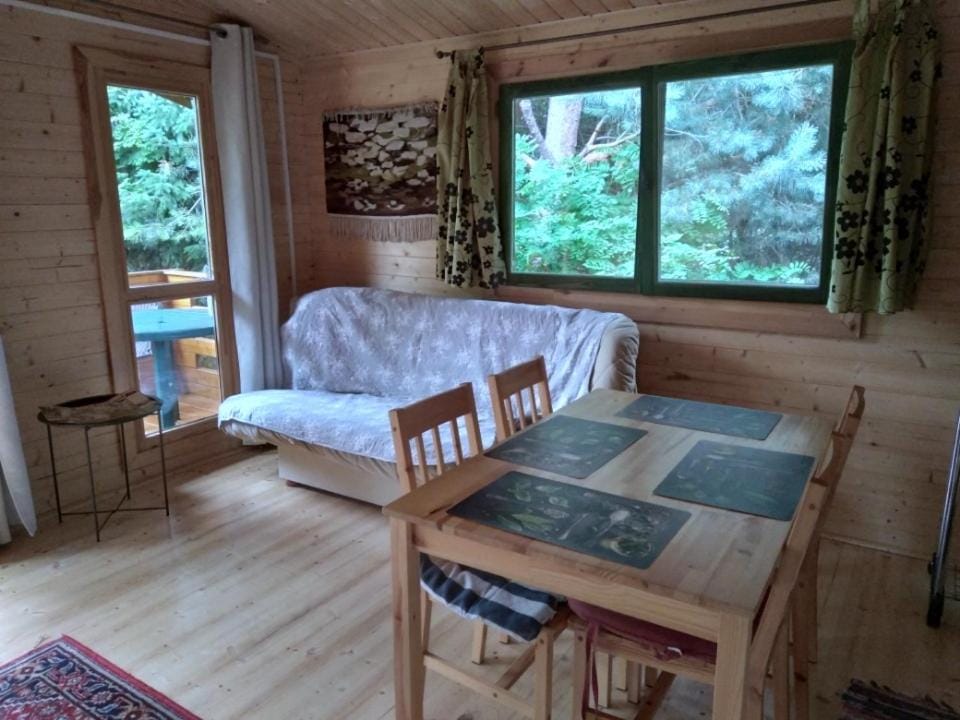 Bed, Living room, Seating area, Dining area, Garden view