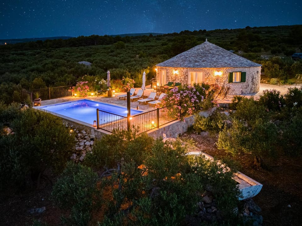 Property building, Night, Natural landscape, Pool view, Swimming pool, sunbed