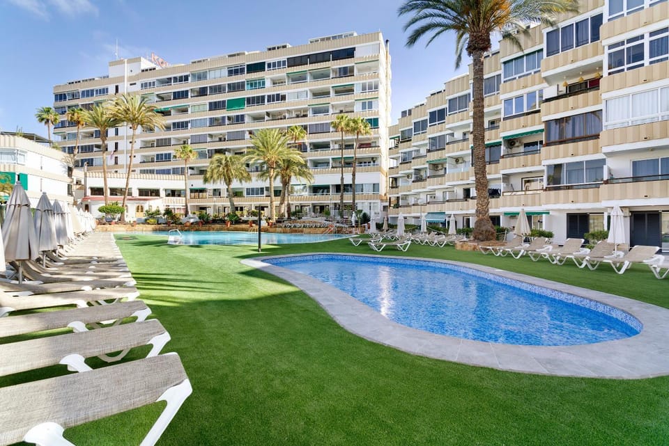 Property building, Living room, Swimming pool