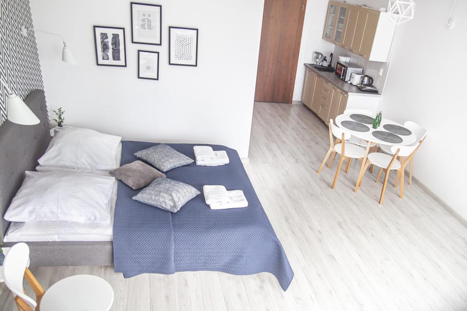 Bed, Photo of the whole room, hair dresser, towels