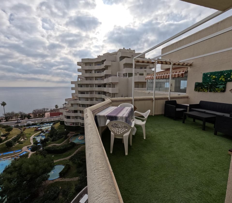 Property building, Patio, Day, Natural landscape, View (from property/room), Balcony/Terrace, Living room, Seating area, Pool view, Sea view, Swimming pool, sunbed
