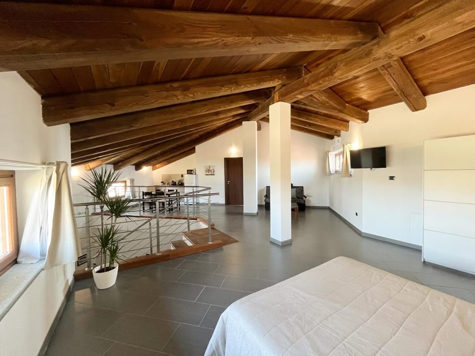 Bed, TV and multimedia, Living room, Seating area
