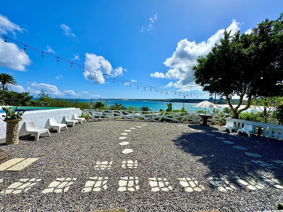 Property building, Patio, Nearby landmark, Day, Natural landscape, Garden view, Sea view, sunbed