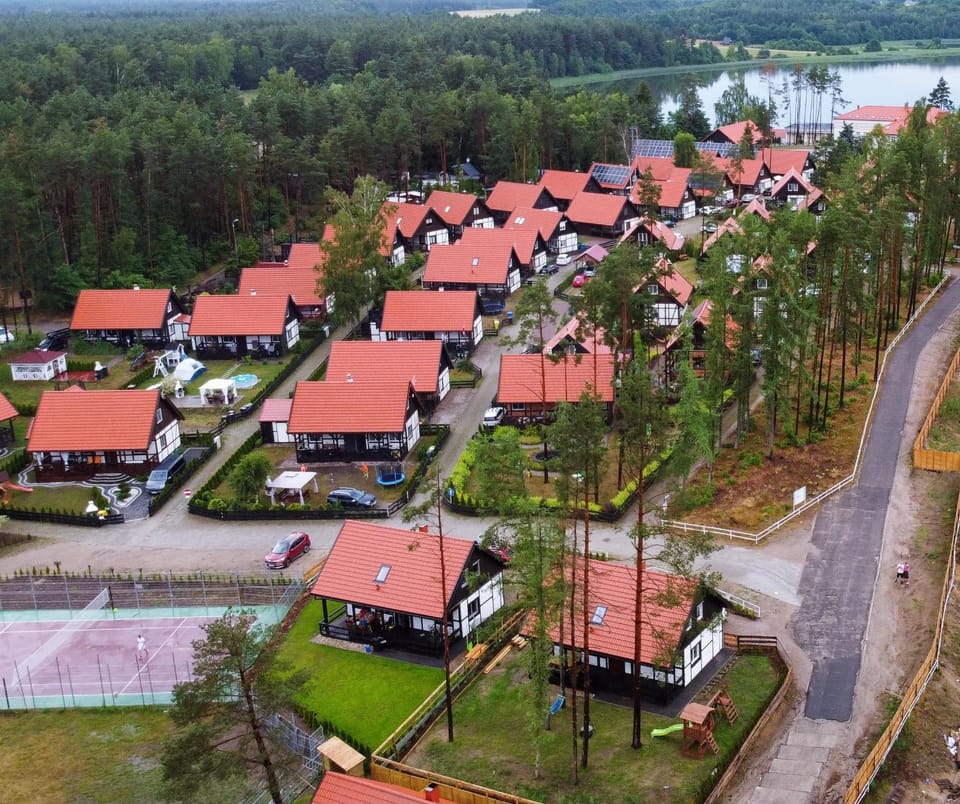 Property building, Restaurant/places to eat, Day, Activities, Bird's eye view, Summer, Children play ground, Garden, Seating area, Beach, Tennis court, City view, Street view, Sports, Location