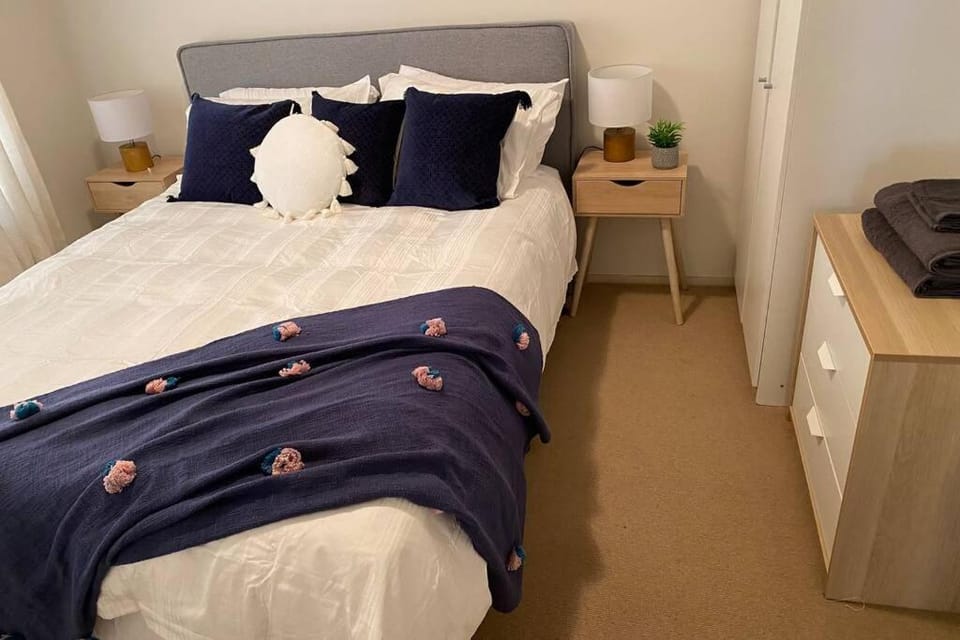 Relax in the spa with views opposite Lake Eildon House in Goughs Bay