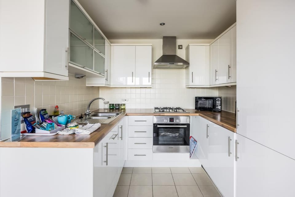 Kitchen or kitchenette, dishwasher, oven, stove, toaster