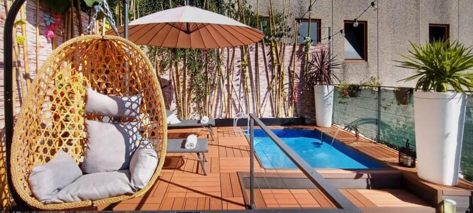 Property building, Living room, Swimming pool