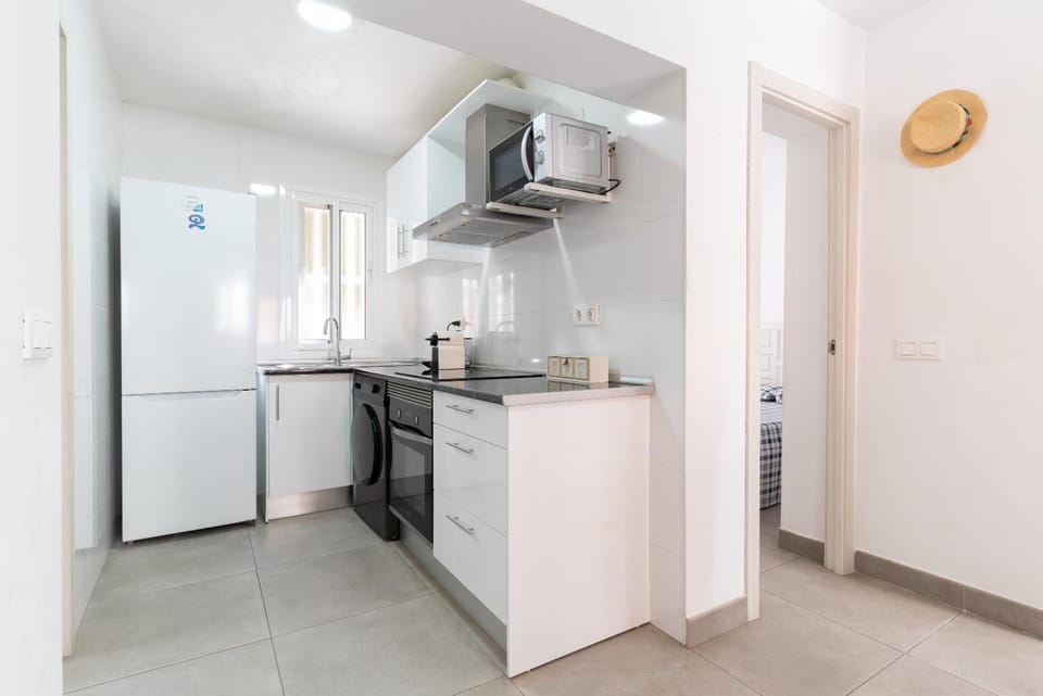 Kitchen or kitchenette, oven, stove, toaster