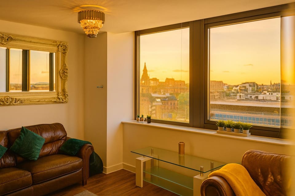 View (from property/room), Living room, Seating area, Sunset