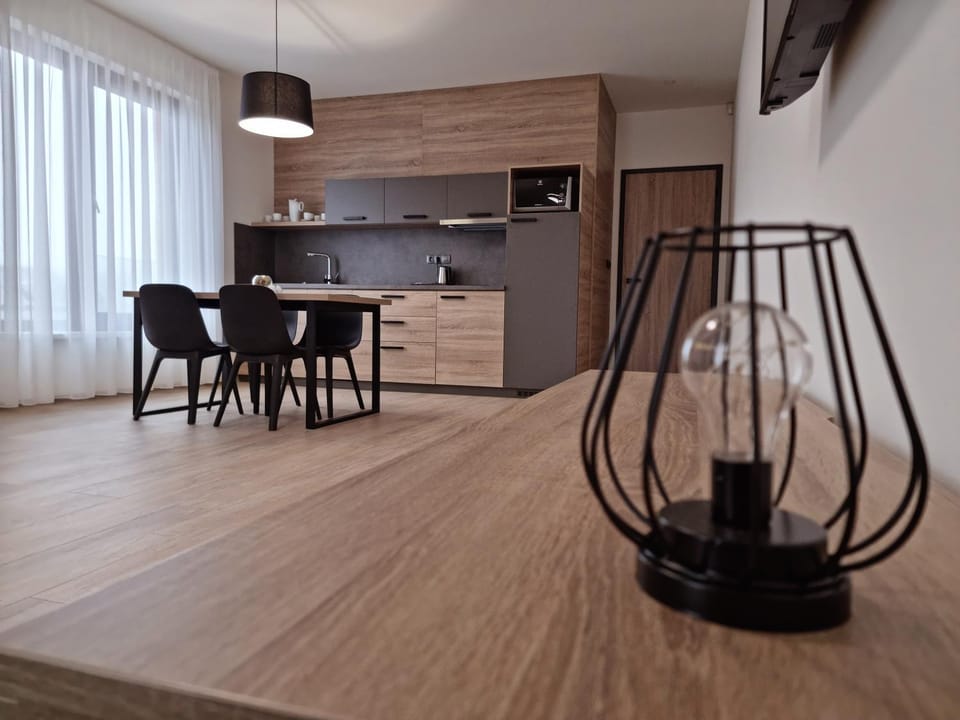 Kitchen or kitchenette, Living room, Seating area, Dining area