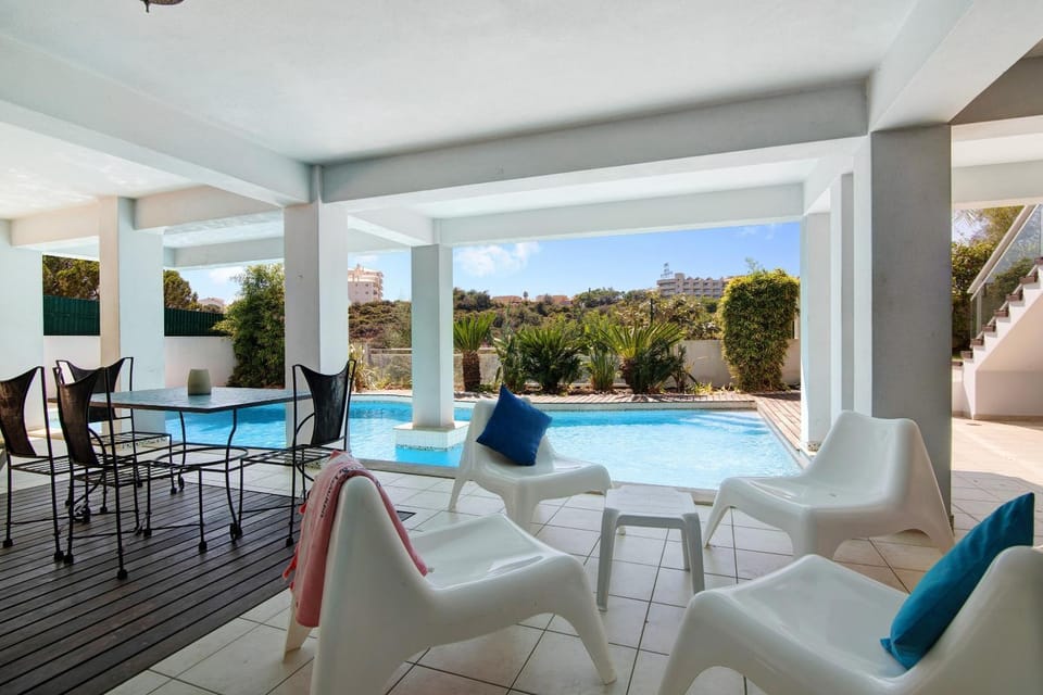 Property building, Living room, Swimming pool