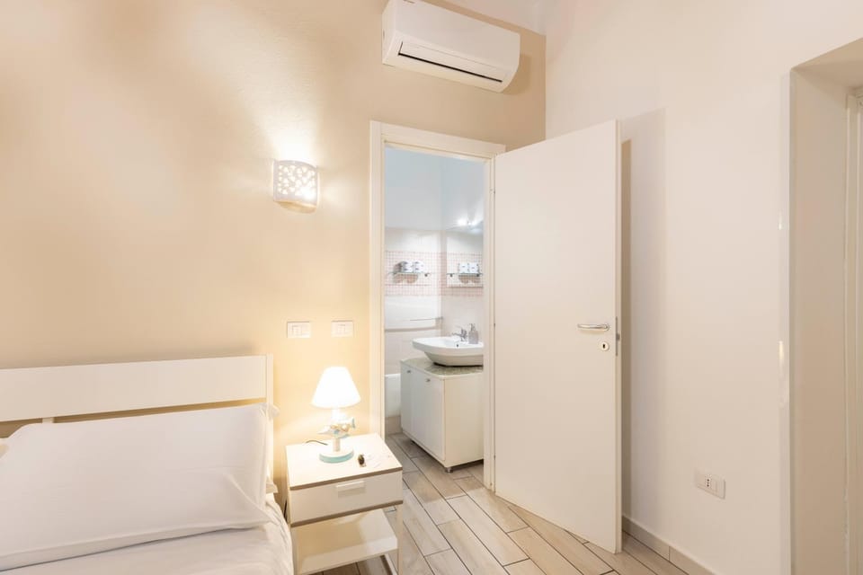 Bed, Bathroom, Photo of the whole room, Bedroom, towels, wardrobe, air conditioner