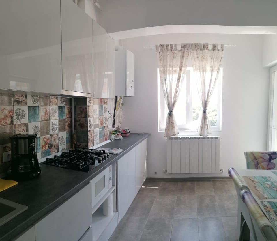 Kitchen or kitchenette, stove