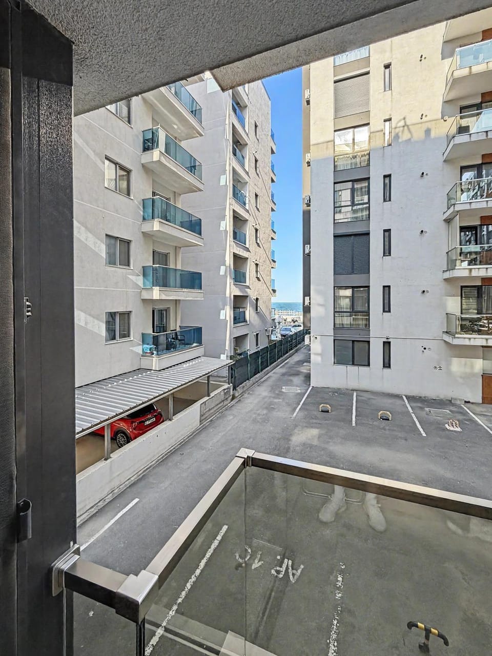 Property building, Day, Neighbourhood, City view, Street view, Location, Parking