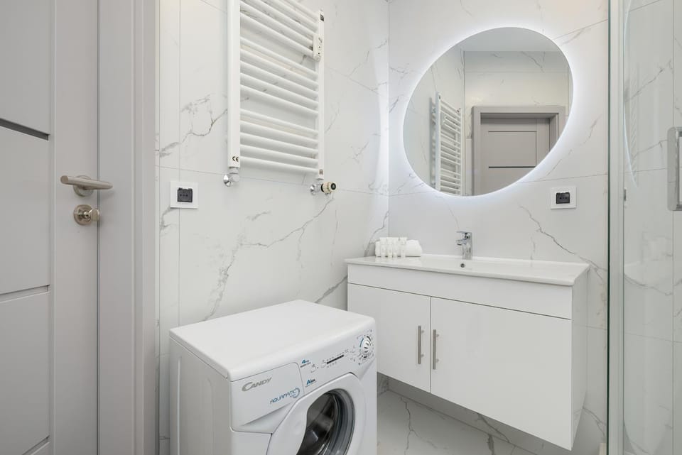 Bathroom, towels, washing machine, dryer