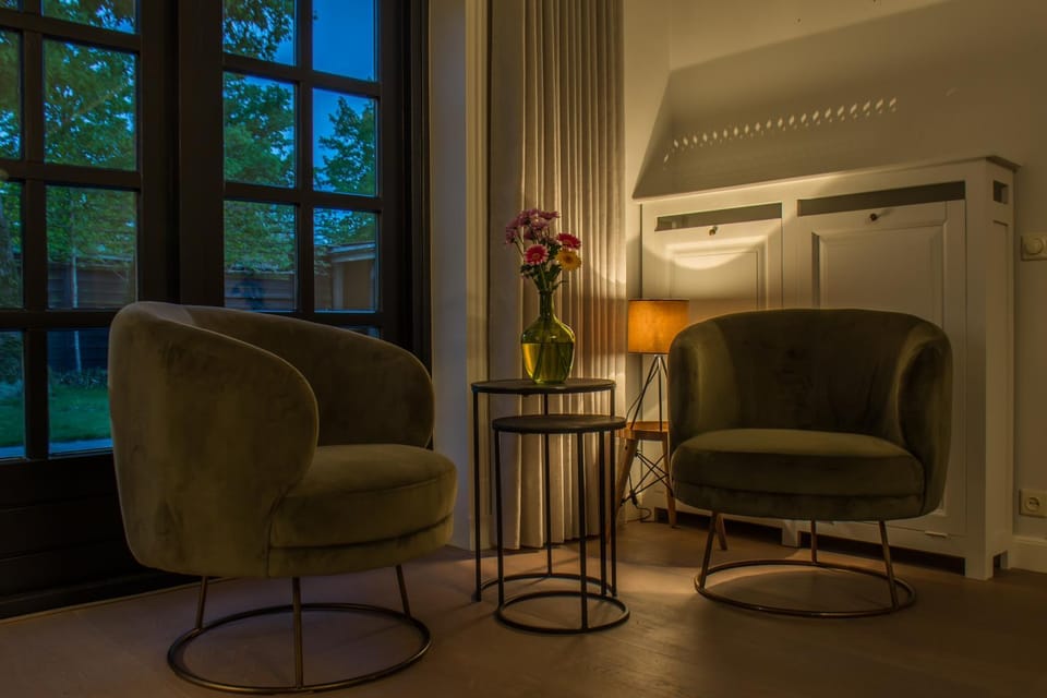 Communal lounge/ TV room, Seating area, Garden view