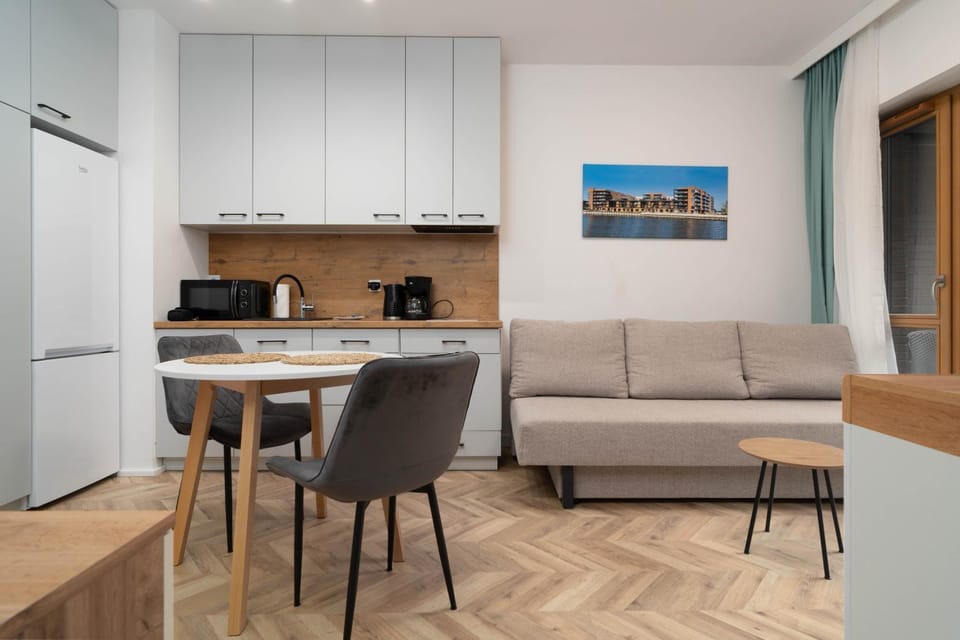 Kitchen or kitchenette, Living room, Seating area, Dining area