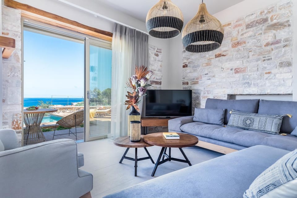 Living room, Seating area, Pool view, Sea view
