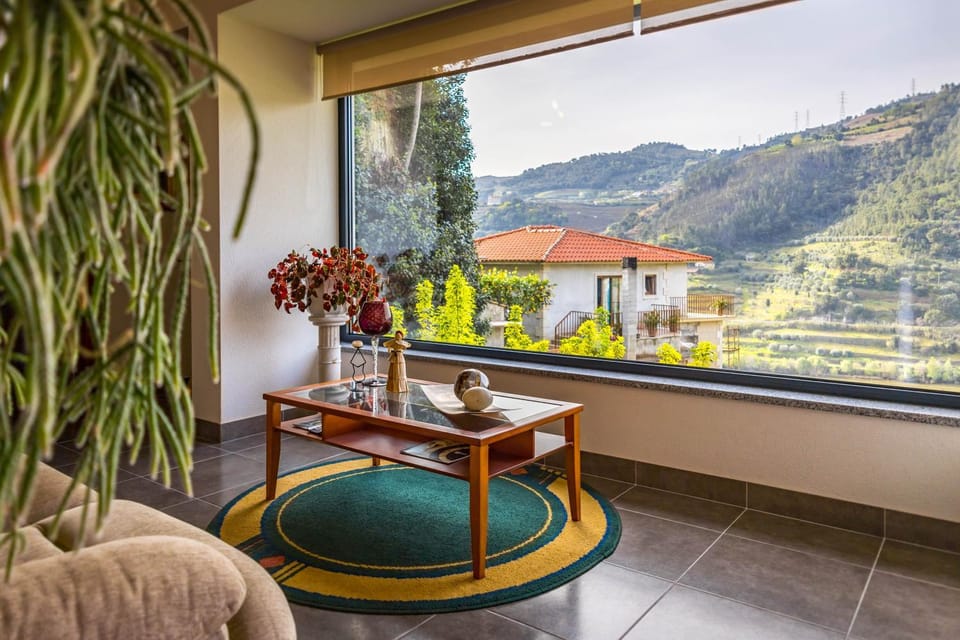 Natural landscape, View (from property/room), Living room, Seating area, Mountain view
