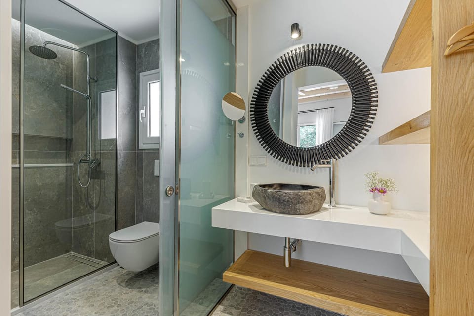 Shower, Toilet, Bathroom, hair dryier, towels, wardrobe