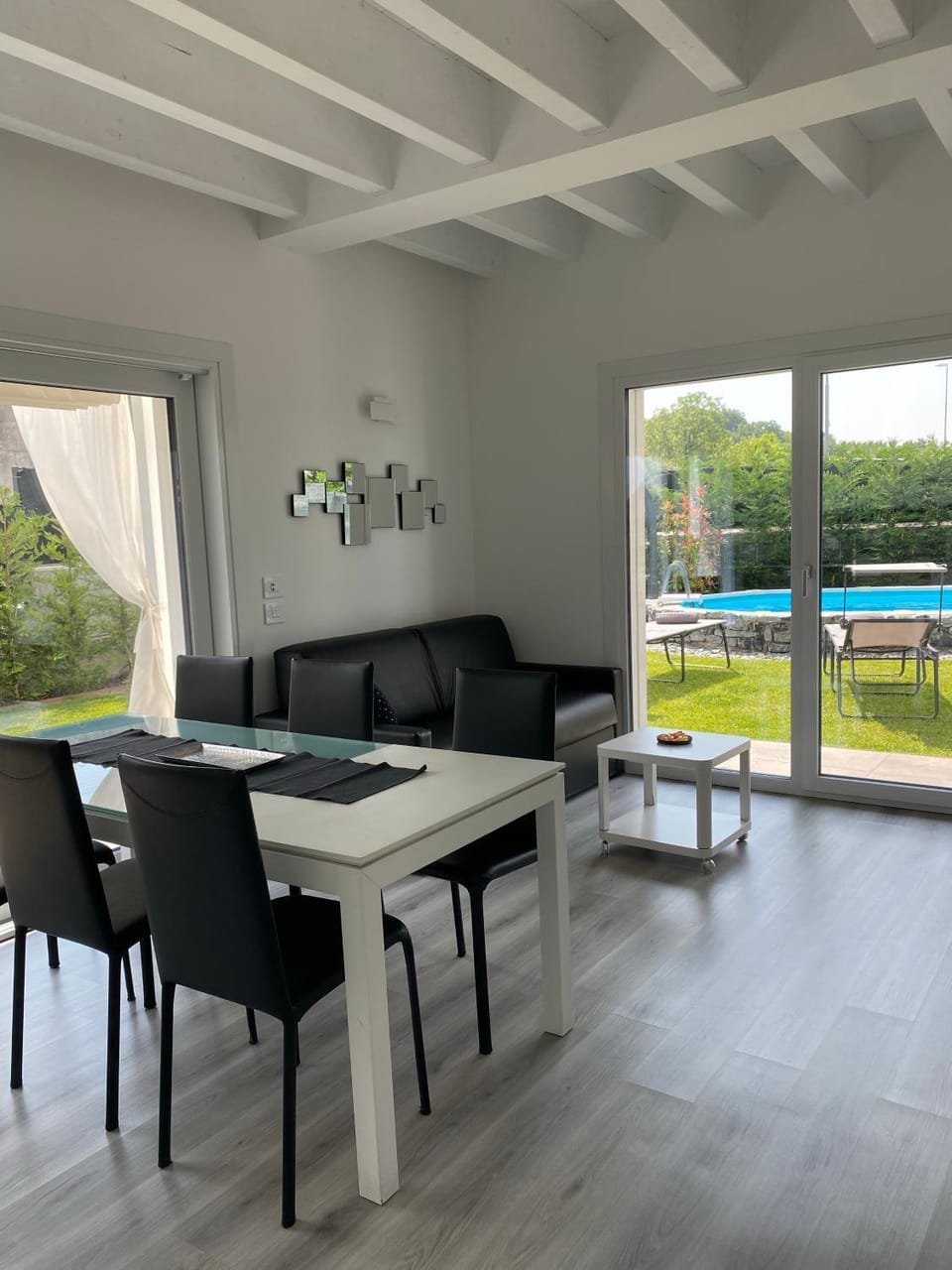 Living room, Dining area, Pool view