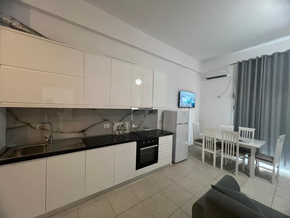 Living room, Seating area, Dining area, dishwasher, oven, stove