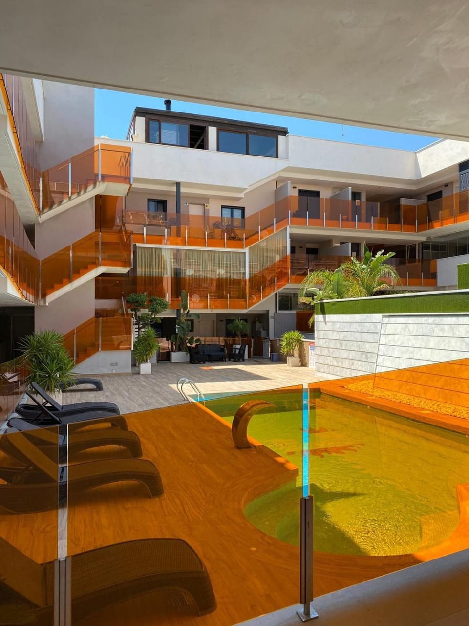 Property building, Pool view, Swimming pool, sunbed