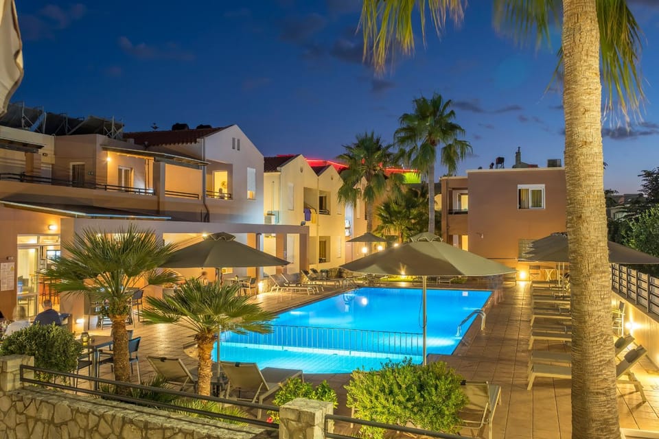 Property building, Patio, Night, Swimming pool, sunbed