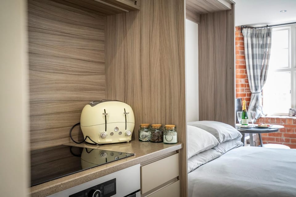 Bed, Kitchen or kitchenette, Bedroom, toaster