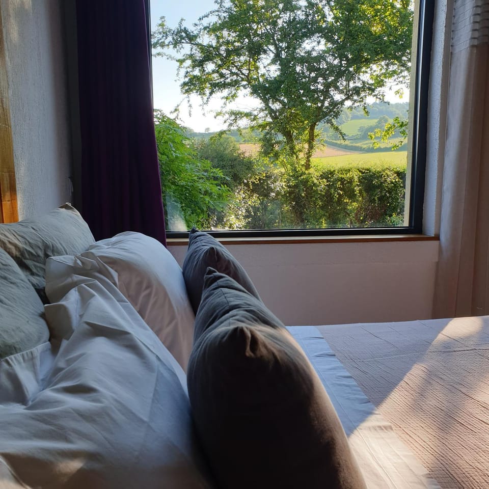 Bed, Natural landscape, View (from property/room), Bedroom, Garden view