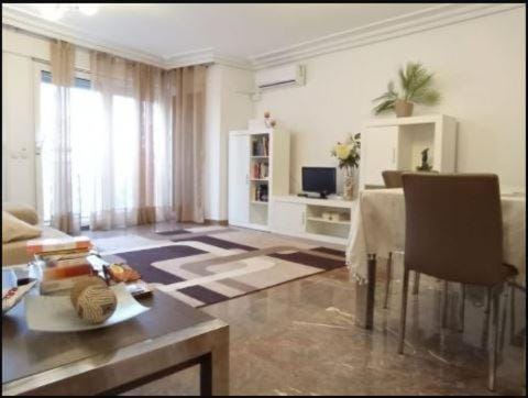 Communal lounge/ TV room, TV and multimedia, Living room, Seating area, Dining area, air conditioner